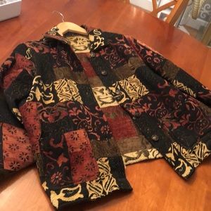 Reversible fall coat.  Adorned in golds.